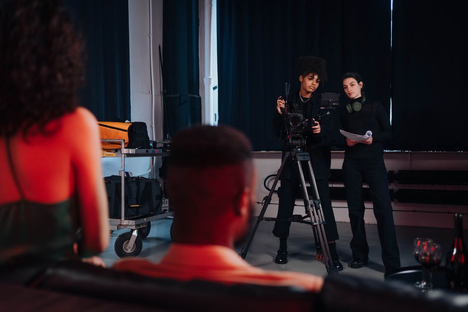 Behind-the-scenes look at a film crew working on set with professional equipment.