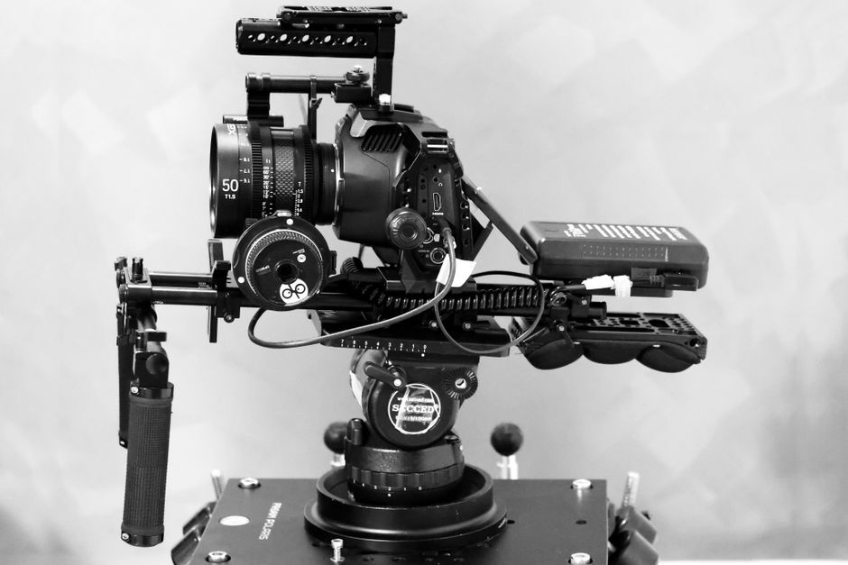 High-quality image of a professional camera setup on a stabilizer rig in monochrome.