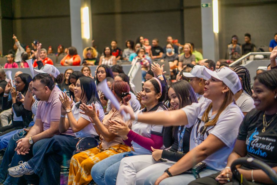 A lively crowd enjoying a cultural event in the Dominican Republic, showcasing local celebrations.