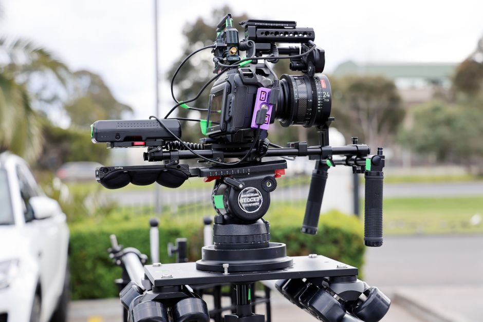 High-end camera rig on a tripod, ideal for outdoor filmmaking in Melbourne.