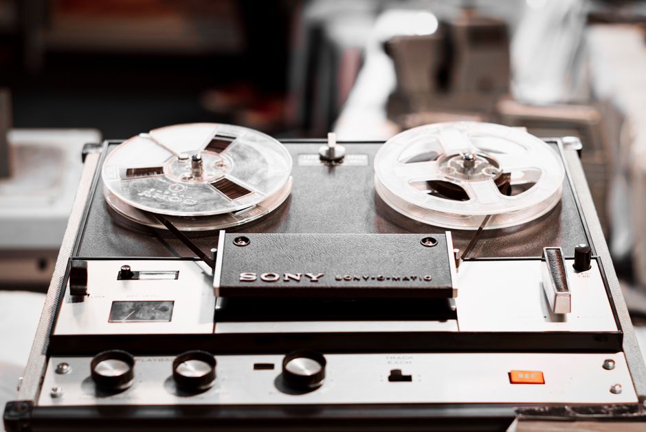 Close-up of a vintage Sony reel-to-reel tape recorder, highlighting classic audio technology.