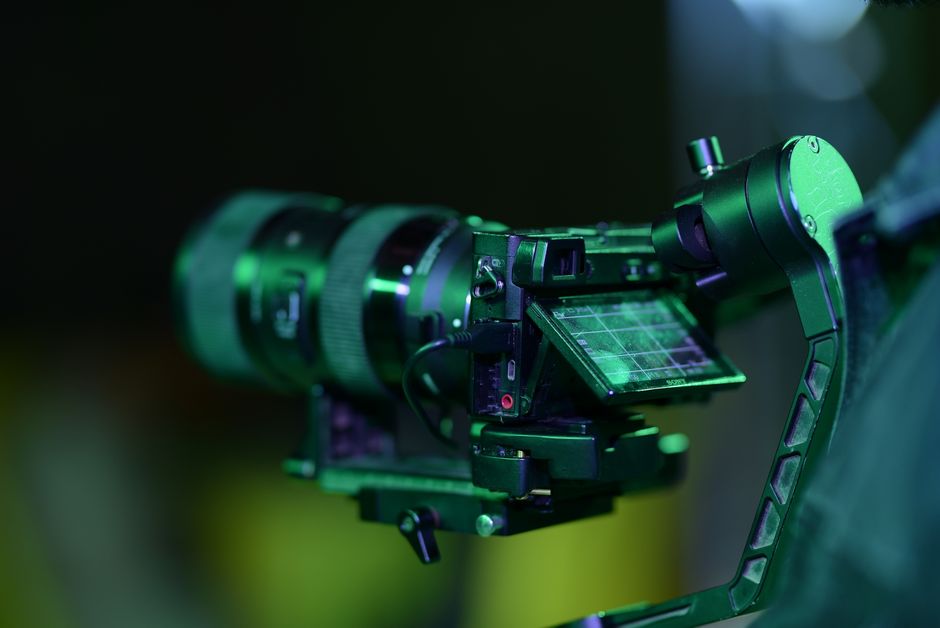 Close-up of a professional camera mounted on a gimbal. Perfect for videography and filmmaking.