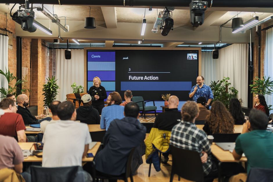 Interactive professional presentation in a modern office setting with diverse audience.