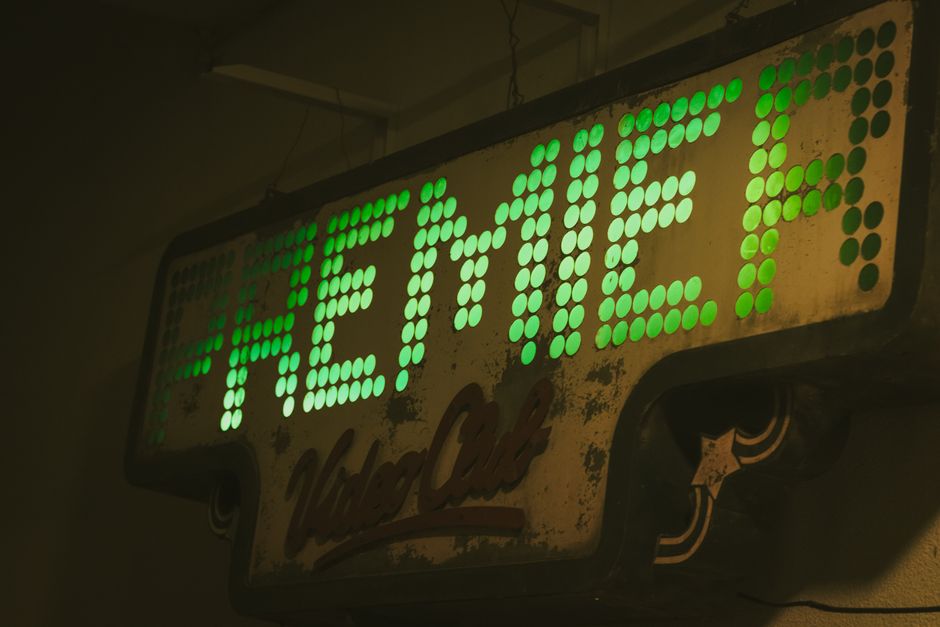Retro Premier Video Club sign with green LED lights in Rosario, Argentina.