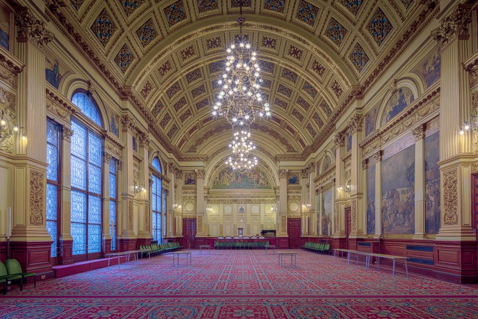 Elegant and historic banquet hall interior at Glasgow City Chambers, Scotland.