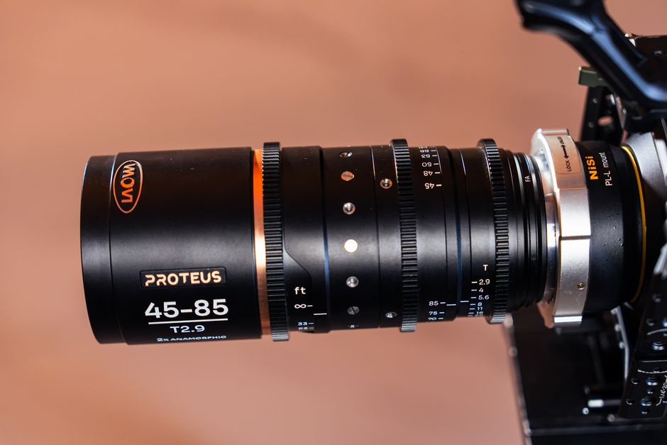 High-quality close-up showing a Laowa Proteus anamorphic lens mounted on a camera.